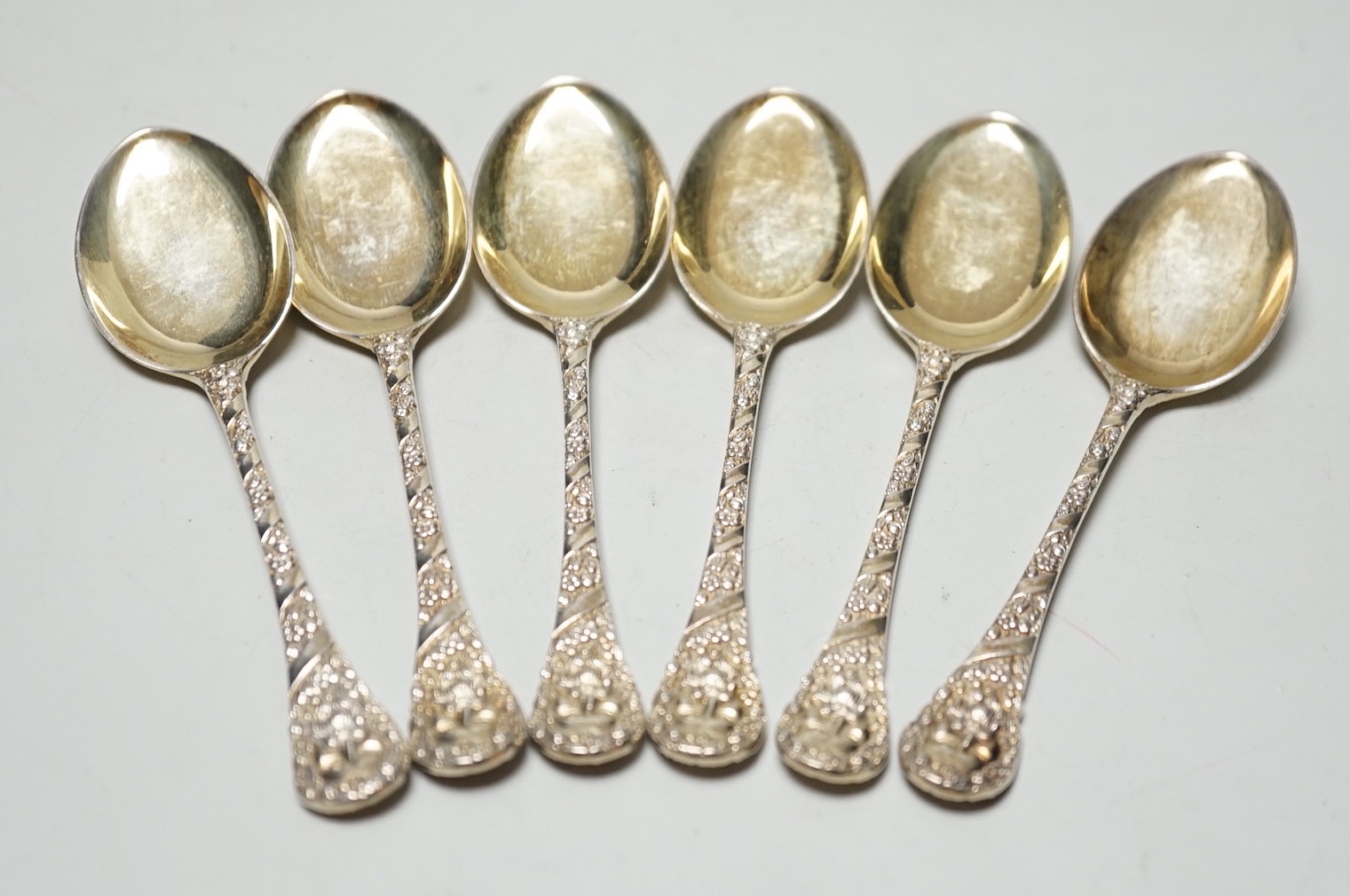 A set of six Edwardian silver gilt preserve spoons, Goldsmiths & Silversmiths Co Ltd, London, 1905, 12.2cm, 4oz.
